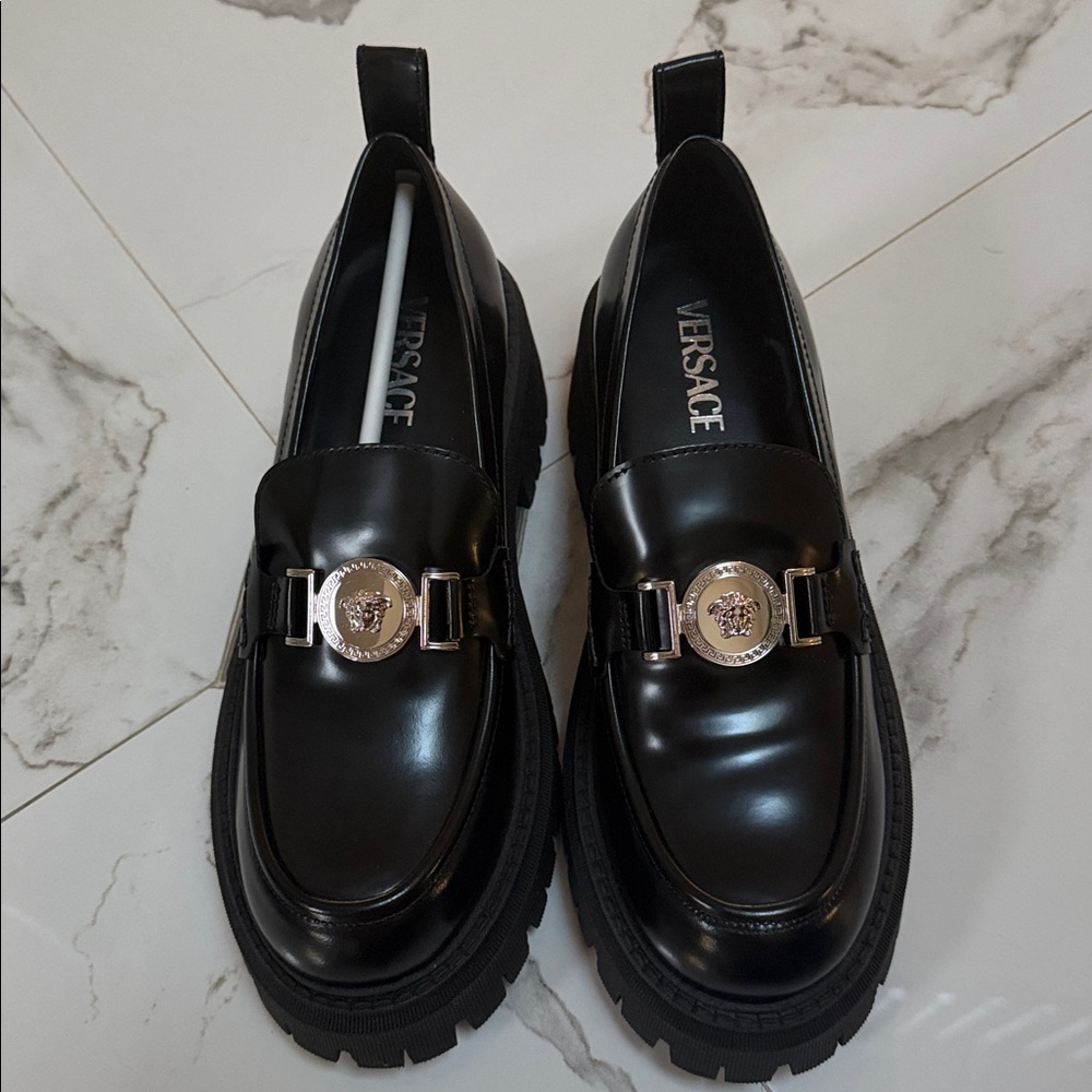 Versace Loafers with Silver Medusa head medallion. Size 39.